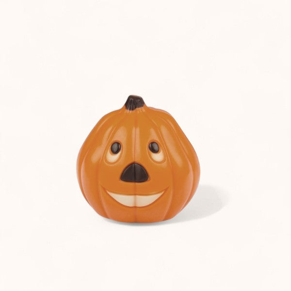 Citrouille en chocolat au lait – bonbon chocolaté artisanal en forme de citrouille, confiserie gourmande spéciale Halloween.