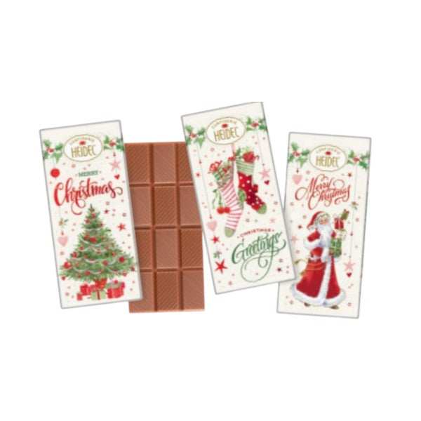 Collection de trois tablettes de chocolat “Noël blanc” au lait, emballées individuellement dans un design rouge et blanc festif.