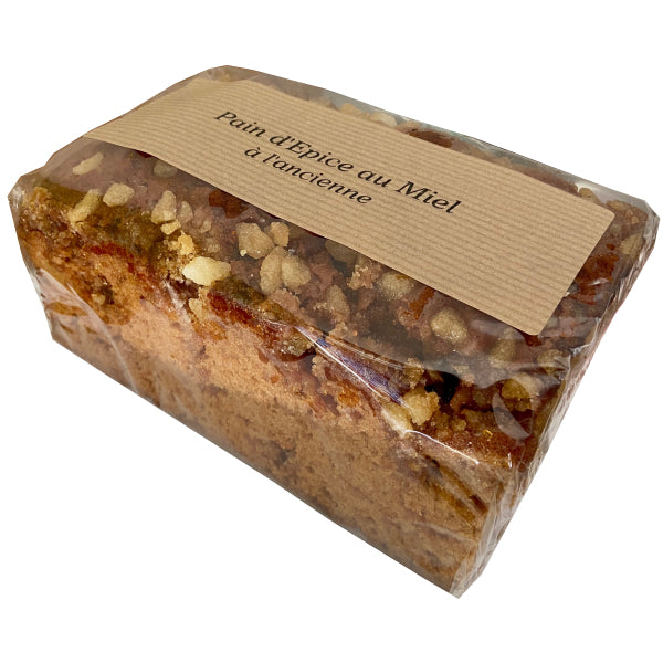 Pain d’épices à l’ancienne au miel emballé, pavé traditionnel de 500 g parsemé de perles de sucre pour une touche gourmande.