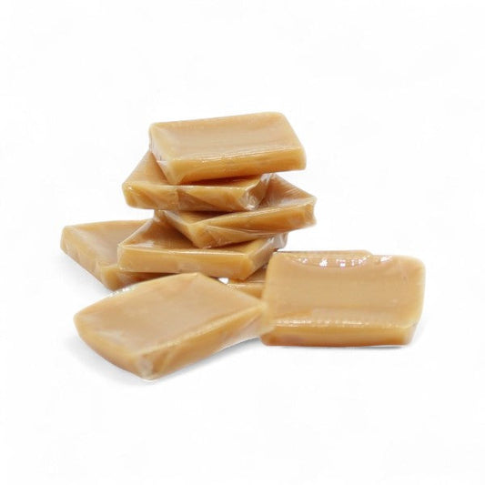 Bouchées caramel noisette, confiseries fondantes au caramel tendre et à la saveur douce et parfumée de noisette.