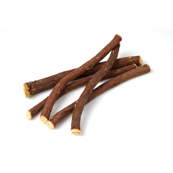 Bâtons de réglisse en vrac, racines naturelles de réglisse italienne à mâcher au goût authentique et légèrement sucré.