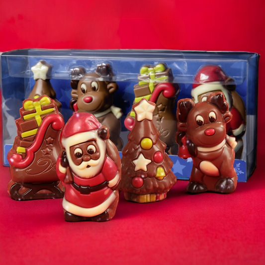 Coffret de moulages en chocolat Figurines de Noël 120g sur fond rouge, chocolats festifs représentant les symboles traditionnels de Noël.