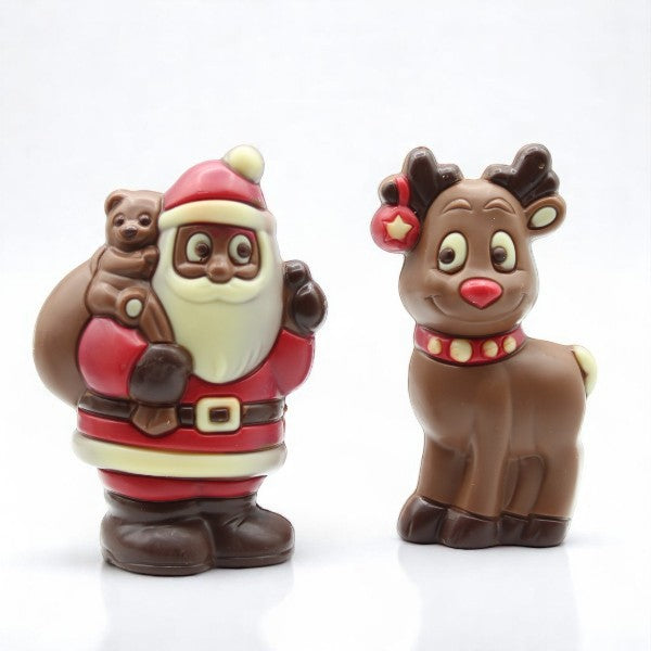 Moulages Père Noël et Renne en chocolat au lait et blanc 150g, figurines festives et gourmandes pour les fêtes de Noël.