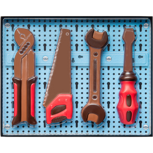Coffret d’outils en chocolat au lait supérieur de 150g, assortiment gourmand avec scie, clé, tournevis et pince multiprise.