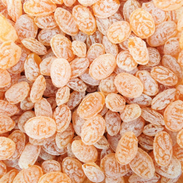 Bonbons au miel en vrac, pastilles traditionnelles en sucre cuit au cœur fondant de miel naturel.