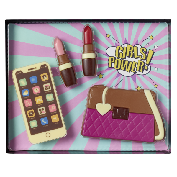 Coffret “Girls Power” en chocolat noir décoré de 135g, contenant un sac à main, deux rouges à lèvres et un smartphone, gourmandise élégante et originale.