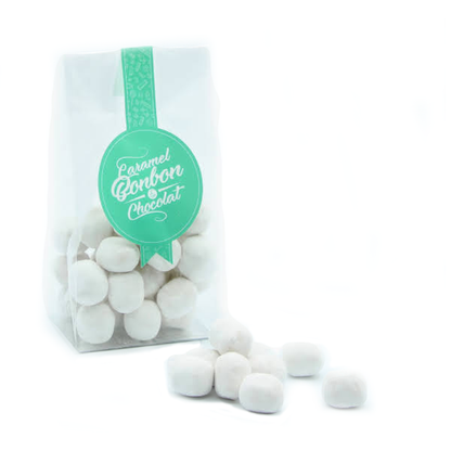 Sachet de bonbons Karaneige, boules blanches au cœur tendre de caramel enrobées de sucre glace.