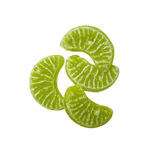 Quatre bonbons Quartiers de pomme verte en vrac, confiseries dures vertes au goût fruité et acidulé de pomme.