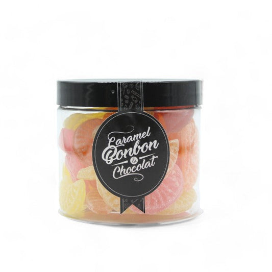Pot de bonbons 3 agrumes, quartiers en sucre cuit aromatisés à l’orange, au citron et au pamplemousse.