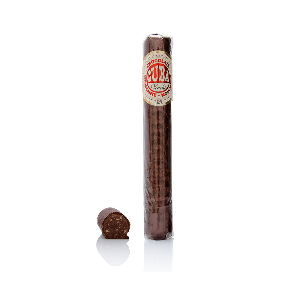 Cigare italien en chocolat Nougatine de 100g, cœur truffé au Gianduja et éclats de caramel, gourmandise raffinée et croquante.