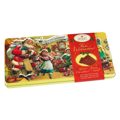 Boîte décorative “Nostalgie” de Noël 120g, coffret en métal élégant contenant de délicieuses tablettes de chocolat au lait supérieur.
