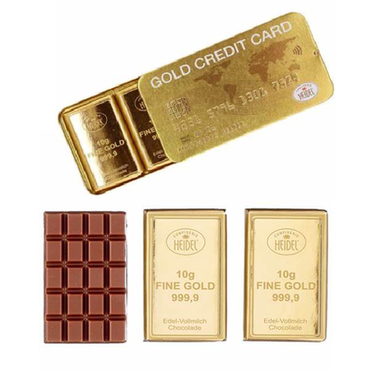 Boîte CB Gold ouverte révélant trois mini tablettes de chocolat au lait, gourmandise originale et raffinée à offrir.
