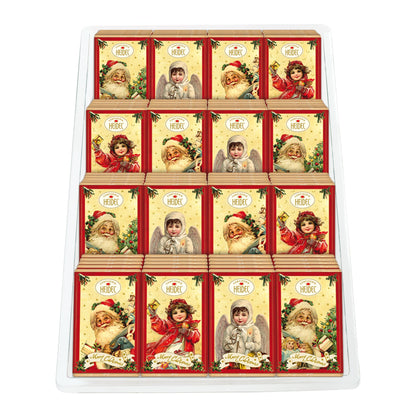 Tablette “Nostalgie” de Noël au chocolat au lait, emballage illustré évoquant la tradition et la chaleur des fêtes de fin d’année.