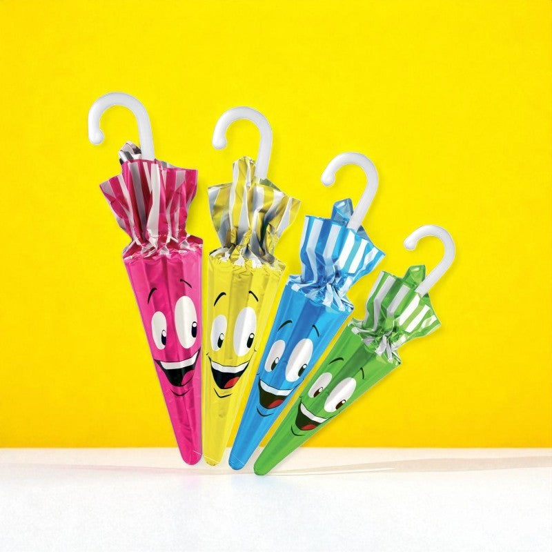 Quatre P’tit Parapluie en chocolat au lait aux emballages rose, jaune, bleu et vert, gourmandises colorées et joyeuses pour petits et grands.