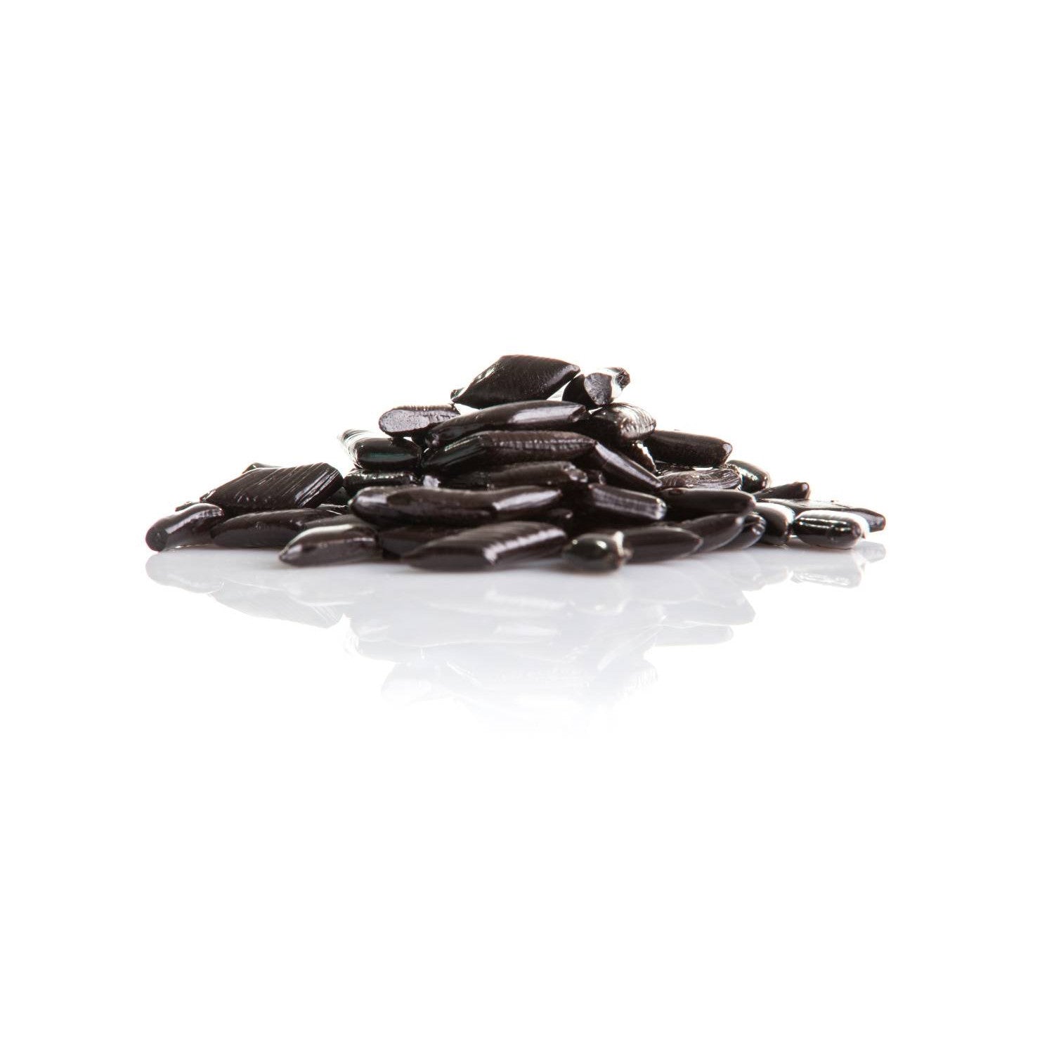 Réglisses dures italiennes “Rombetti” en vrac, bonbons en forme de losange au goût subtil de réglisse et d’anis.