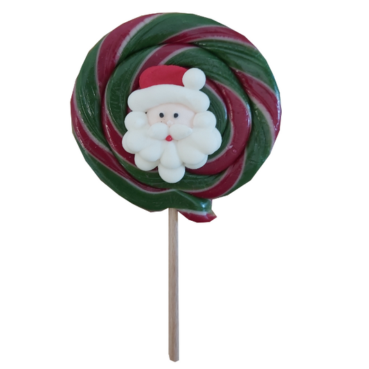 Sucette “Fête foraine” Noël 65g, confiserie ronde en sucre cuit goût pomme avec tête de Père Noël en sucre.