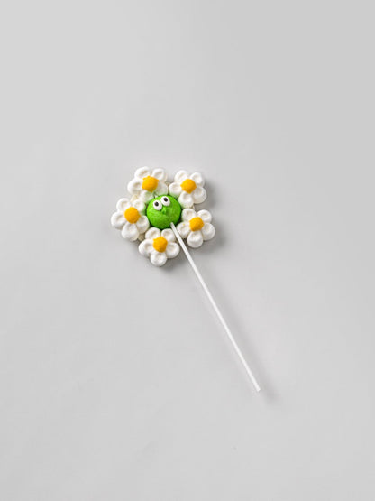 Brochette de guimauve “Fleur de Printemps” verte – friandise moelleuse et colorée, idéale pour un goûter ou une fête.