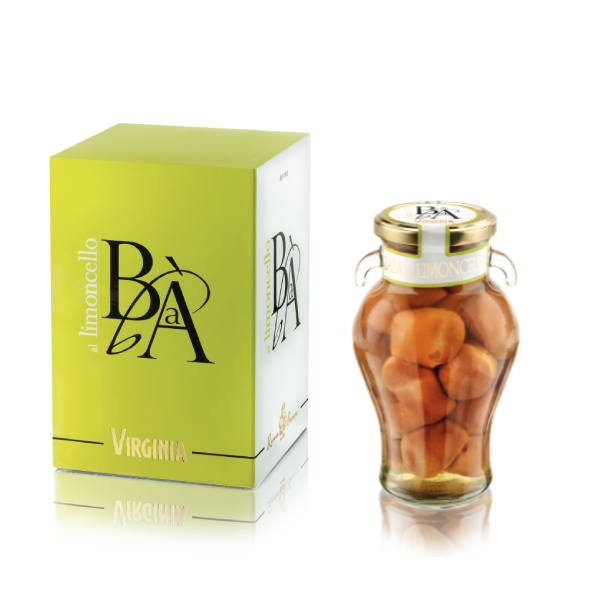 Boîte et pot de Baba au Limoncello, petit gâteau moelleux imbibé d’un sirop au limoncello sucré et citronné.