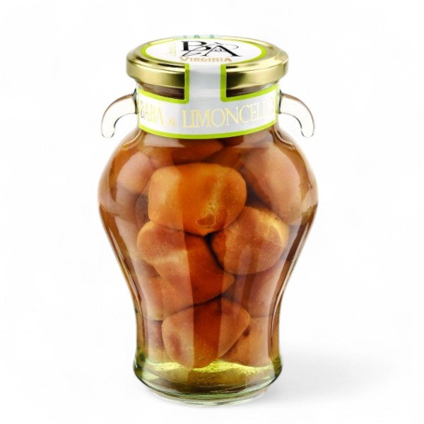 Pot de Baba au Limoncello, petit gâteau imbibé d’un sirop citronné, alliant douceur et fraîcheur.